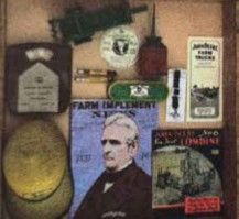 Display of John Deere collectibles, signs and literature